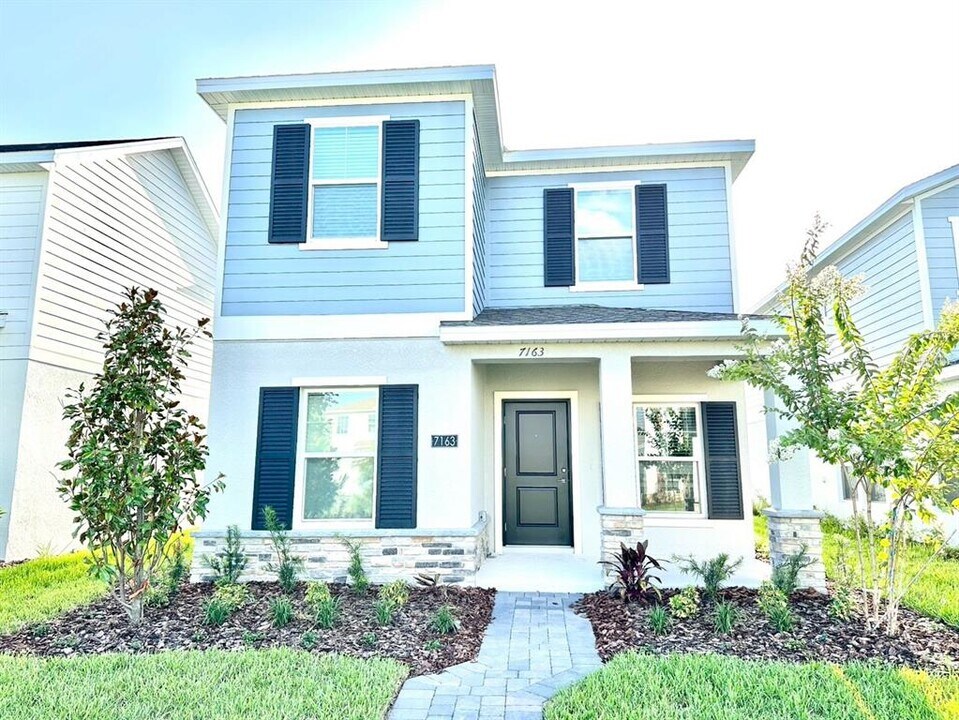 7163 Sienna Oak Aly in Orlando, FL - Building Photo