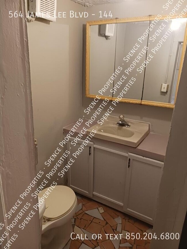 property at 564 W James Lee Blvd