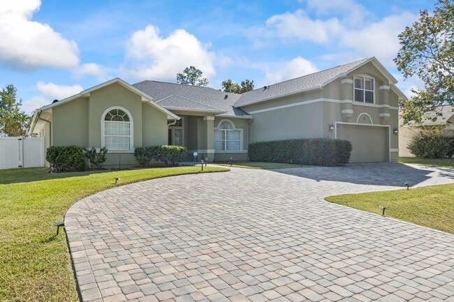 7 Woodfield Dr in Palm Coast, FL - Foto de edificio - Building Photo
