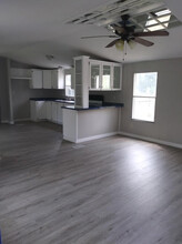 13295 Commonwealth Ave N in Polk City, FL - Building Photo - Building Photo