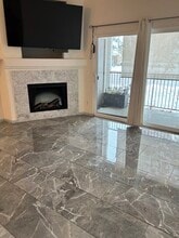 4451 S Ammons St, Unit 1-101 in Denver, CO - Building Photo - Building Photo