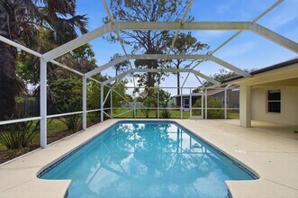 1707 SE Manth Ln in Port St. Lucie, FL - Building Photo - Building Photo