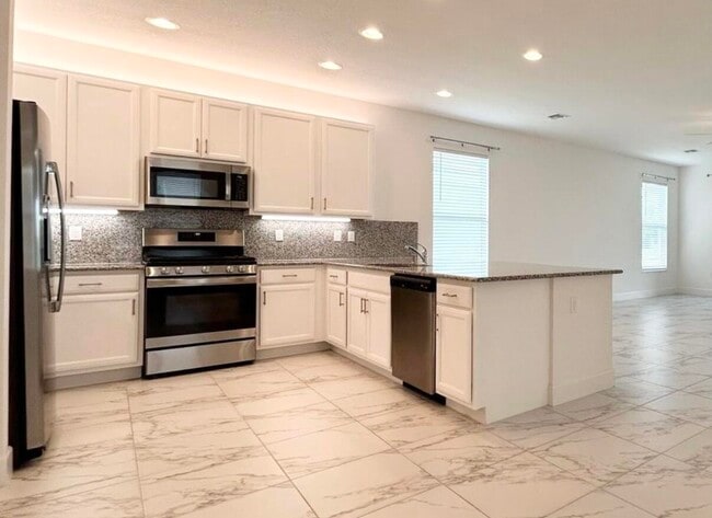 property at 11650 SW Moon River Way