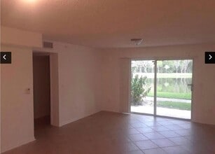 100 Crestwood Ct N, Unit 104 in Royal Palm Beach, FL - Building Photo - Building Photo