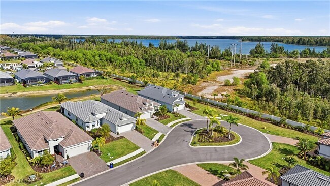 11964 Molto Dr in Miromar Lakes, FL - Building Photo - Building Photo