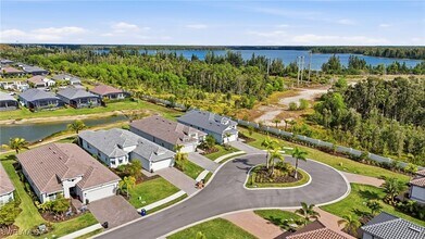 11964 Molto Dr in Miromar Lakes, FL - Building Photo - Building Photo