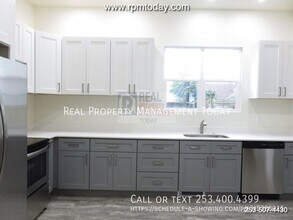 703 S Ainsworth Ave in Tacoma, WA - Building Photo - Building Photo