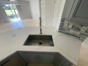 8660 S Southgate Shores Cir in Tamarac, FL - Building Photo - Building Photo