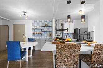 2281 S Vaughn Way in Aurora, CO - Building Photo - Building Photo