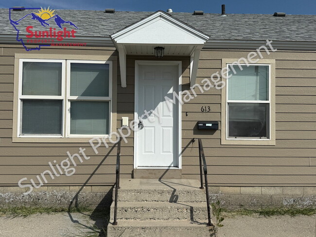 property at 613 W 1st St