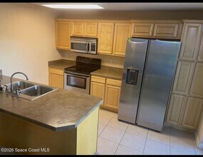 8710 Hibiscus Ct in Cape Canaveral, FL - Building Photo - Building Photo