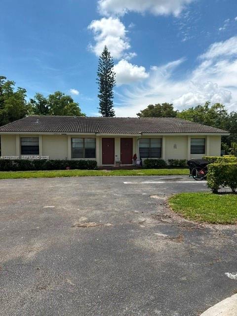property at 10406 NW 36th St