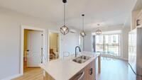 200-1200 Seton Cir SE in Calgary, AB - Building Photo - Building Photo