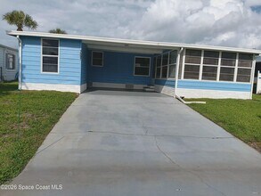 7597 Cedar Bark Rd in Micco, FL - Building Photo - Building Photo