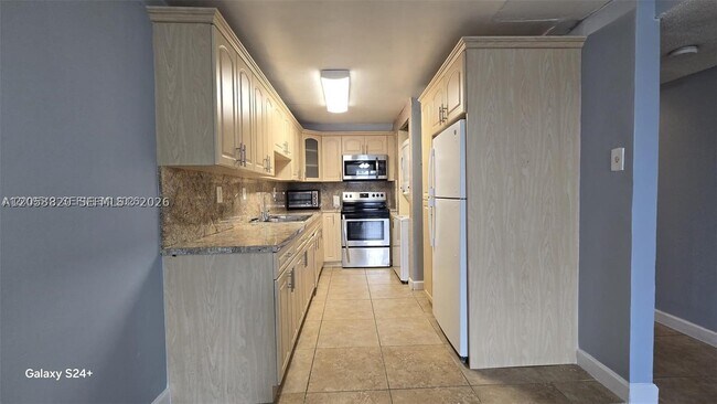 property at 10090 NW 80th Ct
