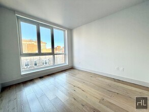 EAST 2ND ST, Unit 2F in New York, NY - Building Photo - Building Photo