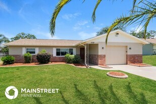 1202 MacFarlane Ave in Spring Hill, FL - Building Photo