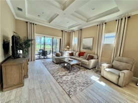 9418 Greyhawk Trl, Unit 02-A201 in Naples, FL - Building Photo