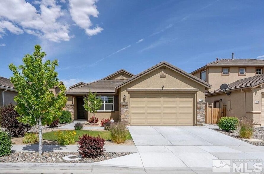 7023 Cinder Village Dr in Sparks, NV - Building Photo