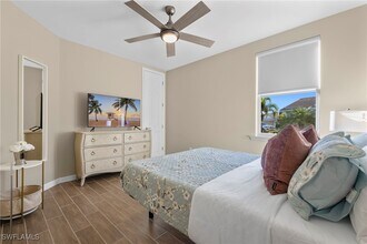 14644 Edgewater Cir in Naples, FL - Foto de edificio - Building Photo