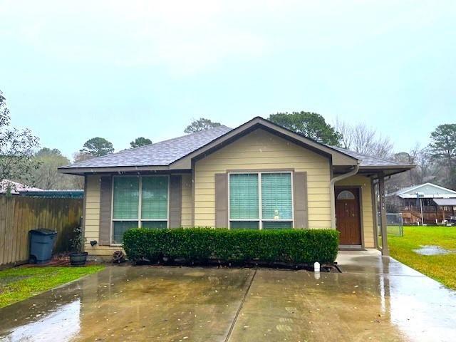 14156 Shadow Bay Dr in Willis, TX - Building Photo