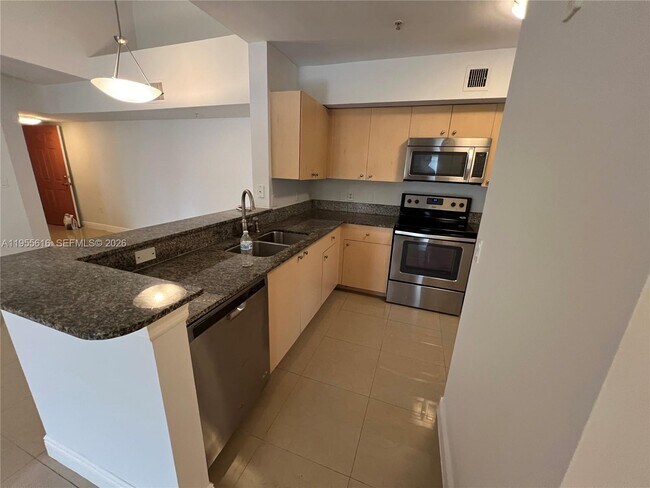 2496 Centergate Dr in Miramar, FL - Building Photo - Building Photo