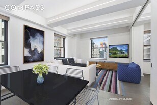 18-20 Pine St, Unit 2704 in New York, NY - Building Photo