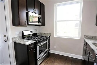 1437 W Carmen Ave, Unit 1F in Chicago, IL - Building Photo - Building Photo