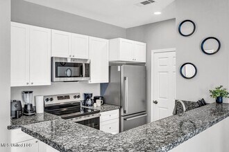 12088 Lamey Brg Rd, Unit Various in D'Iberville, MS - Foto de edificio - Building Photo