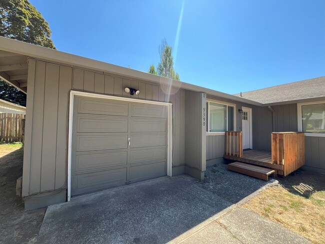 property at 9390 SW Tangela Ct