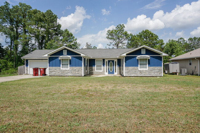 property at 233 Grand Prix Dr