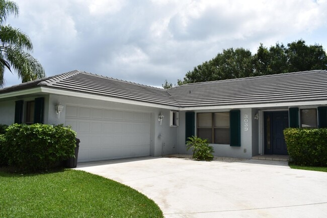 3039 SW Seaboard Ave in Palm City, FL - Building Photo - Building Photo