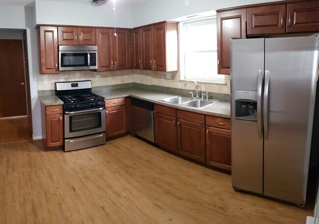 5533 N Mango Ave in Chicago, IL - Building Photo - Building Photo