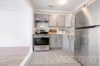 Full-Floor Renovated 2BR | Expansive Living Space | 1 Min to A Train, Unit 3 in Brooklyn, NY - Building Photo - Building Photo