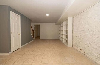 307 E 25th St, Unit Bsmt in Baltimore, MD - Foto de edificio - Building Photo