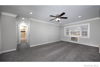 4 Robinson Ave-Unit -309-4 in Patchogue, NY - Building Photo - Building Photo