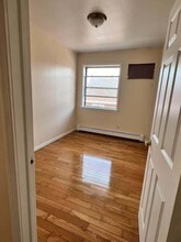 1418 117th St, Unit apartment for rent in College Point, NY - Building Photo - Building Photo