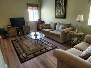20301 Estero Gardens Cir-Unit -201 in Estero, FL - Building Photo - Building Photo