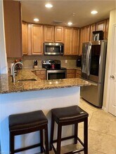 9495 Napoli Ln, Unit 101 in Naples, FL - Building Photo - Building Photo
