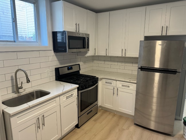 property at 106 E 5th St