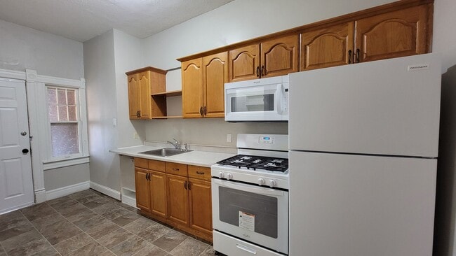 property at 1 1/2 E 26th St