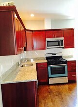 49 Beech Glen St, Unit 2 in Boston, MA - Foto de edificio - Building Photo