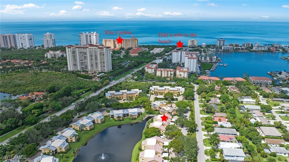 577 Beachwalk Cir in Naples, FL - Building Photo
