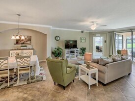 9114 Prima Way, Unit 102 in Naples, FL - Building Photo