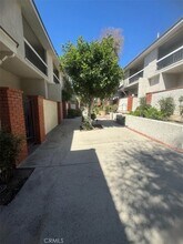 10201 Mason Ave, Unit 113 in Los Angeles, CA - Building Photo - Building Photo