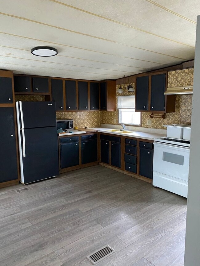 property at 16945 Rooster Ln