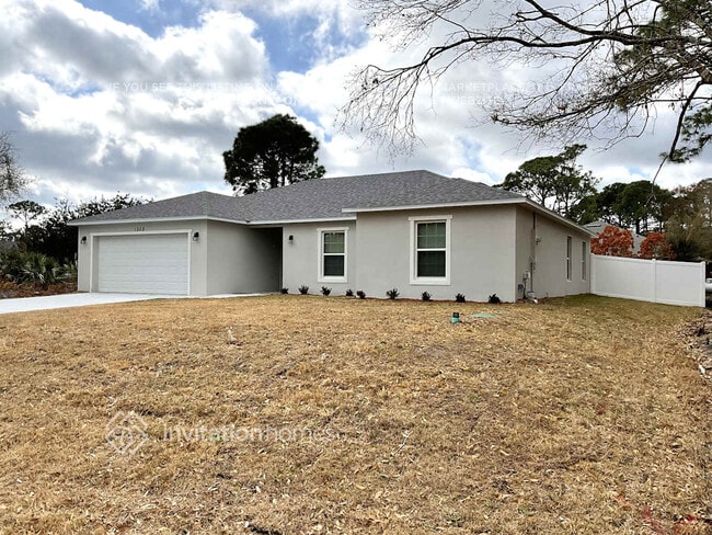 1302 Packer Rd SE in Palm Bay, FL - Building Photo - Building Photo