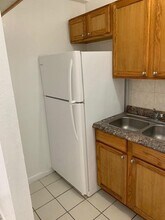 7841 Johnson St-Unit -106 in Pembroke Pines, FL - Building Photo - Building Photo