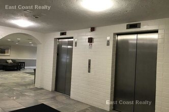 115 W Squantum St-Unit -1211 in Quincy, MA - Building Photo - Building Photo