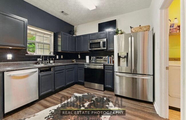 1689 Camden Forrest Way in Riverdale, GA - Building Photo - Building Photo